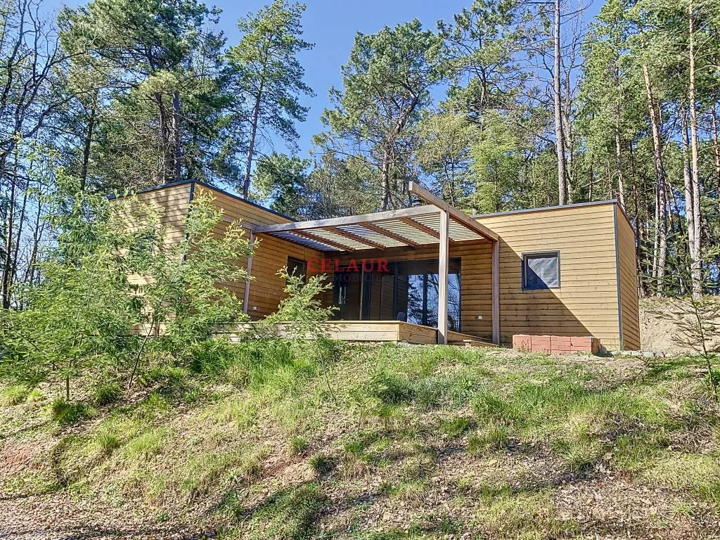 WOODEN HOUSE OF 2022 ON 5041 M&sup2; OF WOOD