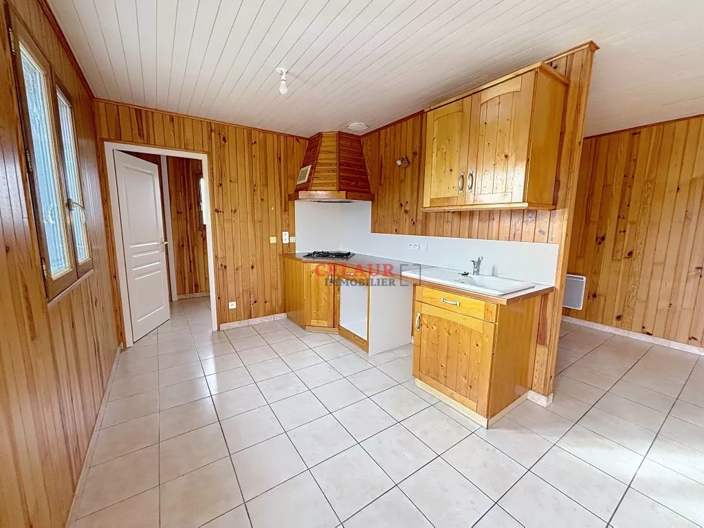 PLAIN PIED A OSSATURE BOIS SUR 1566 M&sup2; DE TERRAIN