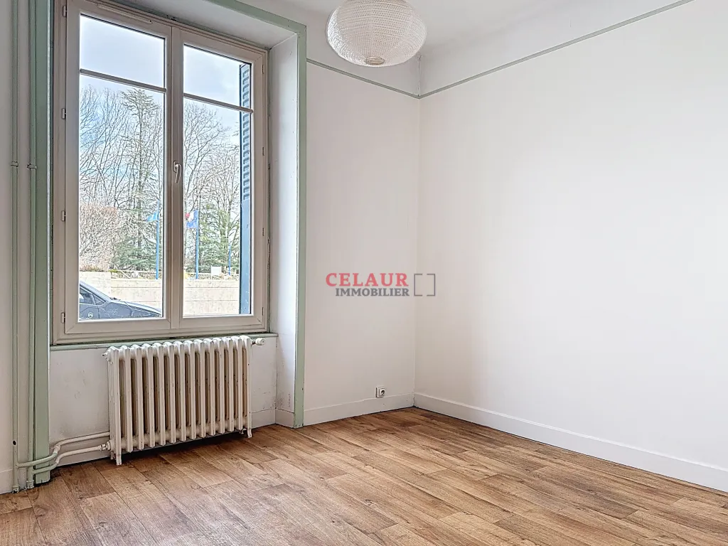 Maison mitoyenne en plein centre